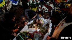 The funeral of Ukrainian decathlete and soldier Volodymyr Androshchuk in Letychiv, Ukraine, on February 1