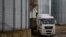 A truck carrying corn is seen at a grain storage facility in the village of Bilohirya, Khmelnytskyiy region, Ukraine.