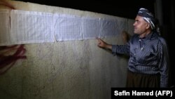 Իրաք - Ընտրողների ցուցակները ընտրատեղամասերից մեկում, Էրբիլ, 25-ը սեպտեմբերի, 2017թ․