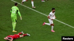 Իրանի թիմը տոնում է հաղթանակը Ուելսի նկատմամբ, «Ահմադ բին Ալի» մարզադաշտ, Ալ Ռայան, 25-ը նոյեմբերի, 2022թ.