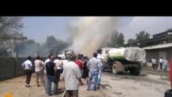 Сӯхтор дар анбори як мағозаи зарфҳои пластикӣ