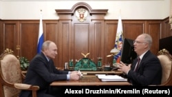 Президент РФ Володимир Путін та генеральний директор Російського фонду прямих інвестицій Кирило Дмитрієв