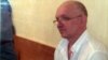 Подсудимый лидер оппозиционной партии "Алга" Владимир Козлов. Актау, 13 сентября 2012 года.