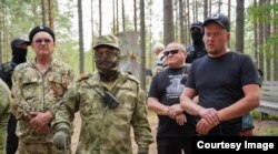 "Казаки" и члены "Русской общины" в Сандармохе