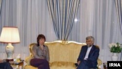 سعید جلیلی، مذاکره‌کننده ایرانی، به همراه کاترین اشتون، رئیس سیاست خارجی اتحادیه اروپا