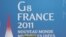 Плакат саммита «Большой восьмерки» во французском Довиле