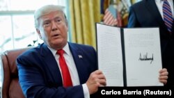 Дональд Трамп Ак үйдө журналисттер менен жолугушууда. 1-июль, 2019-жыл. 