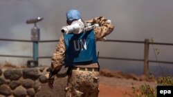 Член миротворчої місії ООН біля сирійсько-ізраїльського кордону в районі Голанських висот. Сирія, серпень 2014 року