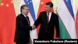 Shavkat Mirziyoev (left) and Chinese President Xi Jinping have met several times since the Uzbek leader came to power in 2016. (file photo)