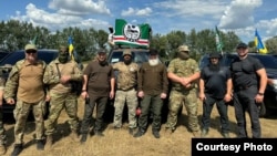 Бойцы чеченского добровольческого батальона имени шейха Мансура 