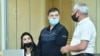 Azerbaijan - Armenian prisoner Viken Euljekian (center) stands trial in Baku, June 8, 2021.