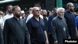 Armenia - Priests and members of jailed businessman Samvel Karapetian's family lead a demonstration in Yerevan, July 4, 2025.
