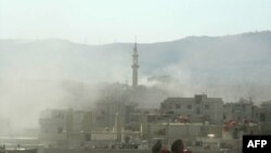 Дым над пригородом Дамаска Гхутой, как говорят повстанцы - химический газ
