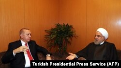 Президент Турции Реджеп Тайип Эрдоган (слева) и президент Ирана Хасан Рухани