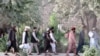 Newly freed Taliban prisoners leave a Kabul prison on August 13. 