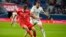 Russia's Aleksandr Sobolev (left) and Iraq's Ali Adnan challenge for the ball during the international friendly soccer match in St.Petersburg, Russia, on March 26.