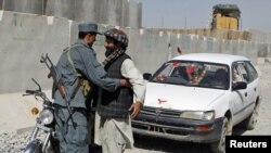 Afghan officials said one of the attacks involved a car bomb, which was detonated near a security checkpoint in the southern Kandahar Province on February 13. (file photo)