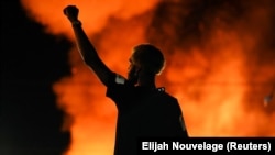 Після стрілянини в Атланті у США та світі з новою силою спалахнули протести проти расизму – фоторепортаж