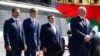 Alyaksandr Lukashenka (right) and his sons (left to right) Viktar, Mikalay, and Dzmitry attend a wreath-laying ceremony marking the 73rd anniversary of the victory over Nazi Germany in Minsk on May 9.