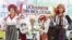 Представлення традиційного українського народного одягу в Молдові на фестивалі «IaMania». На плакаті напис: «Українці з Молдови». Село Голлеркані, що за 52 кілометри на північний схід від Кишинева, 9 липня 2016 року