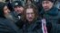 Maksim Vinyarski is detained while protesting in Moscow in December 2012.