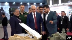 Министр обороны РФ Андрей Белоусов на выставке "Армия-2024", ставшей для него пока первой и последней