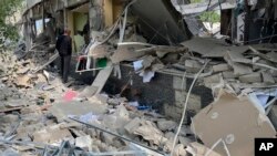 Будівля зруйнована російською ракетою в Дергачах, на околиці Харкова, Україна, 26 серпня 2022 року. Фото ілюстративне