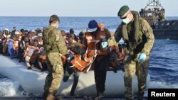 Жер ортолук деңизинен куткарылган  мигранттар. 13-май, 2015-жыл. 