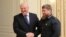 Belarusian President Alyaksandr Lukashenka (left) shakes hands with Ramzan Kadyrov, the leader of Russia's Chechen region in Minsk on September 25.