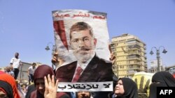 Одна из акций сторонников Мохаммеда Мурси в Каире