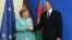 Канцлер Германии Ангела Меркель (слева) и президент Азербайджан Ильхам Алиев