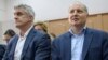 Michael Calvey (left) and Philippe Delpal attend a court hearing in Moscow in October 2019.