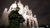 A French soldier stands guard outside the Sacre Coeur Basilica on November 16 in Paris.