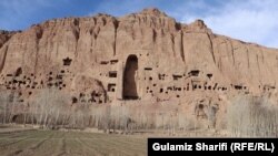 This photo shows dozens of caves and the empty alcove that once housed Solsol, a 55-meter high statue of the Buddha.