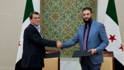 گفت‌وگو با مهرداد فرهمند دربارهٔ ترکیب اعضای دولت انتقالی سوریه