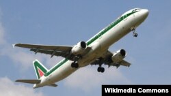 An Alitalia airplane pictured during takeoff.