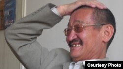 Алым Токтомушев.