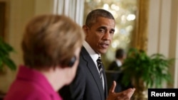 باراک اوباما، رییس جمهوری آمریکا همراه با آنگلا مرکل، صدراعظم آلمان