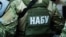 Ілюстраційне фото. Співробітник Управління спеціальних операцій Національного антикорупційного бюро України (НАБУ)