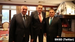 Republika Srpska Prime Minister Radovan Viskovic (left), Bosnian Serb leader Milorad Dodik (center), and Hungarian Prime Minister Viktor Orban near Banja Luka on November 6.