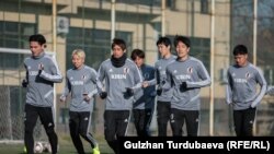 Дастаи футболи Ҷопон. Акс аз бойгонӣ.