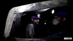 Iran -- Iranian coal miners in a track inside a coal mine in Tabas in Yazd Province, undated