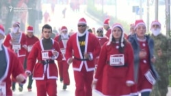 Santa Claus On The Streets Of Kosovo
