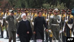 Пакистандын премьер-министри Имран Хан менен Ирандын президенти Хасан Роухани. 22-апрель, 2019-жыл. Тегеран.