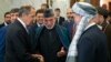 Бывший президент Афганистана Хамид Карзай (в центре) представляет делегацию «Талибана» министру иностранных дел России Сергею Лаврову (слева) перед встречей в Москве, 28 мая 2019 года.