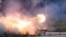 Russia -- A "TOS-1 Buratino" multiple rocket launcher fires during the "Russia Arms Expo 2013" 9th international exhibition of arms, military equipment and ammunition, in the Urals city of Nizhny Tagil, September 25, 2013