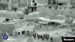 تصویری از حرکت نیروهای اسرائیلی به داخل نوار غزه. ۱۷ ژوئیه ۲۰۱۴.