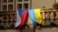 Czech and Ukrainian flags that were placed on the balcony of the Czech parliament building on November 6. 
