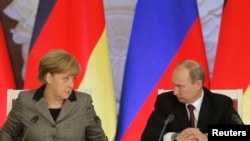 Ангела Меркель, канцлер Німеччини та Володимир Путін, президент Росії