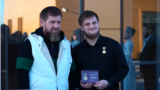 Глава Чечни Рамзан Кадыров и его старший сын Ахмат, министр спорта Чечни